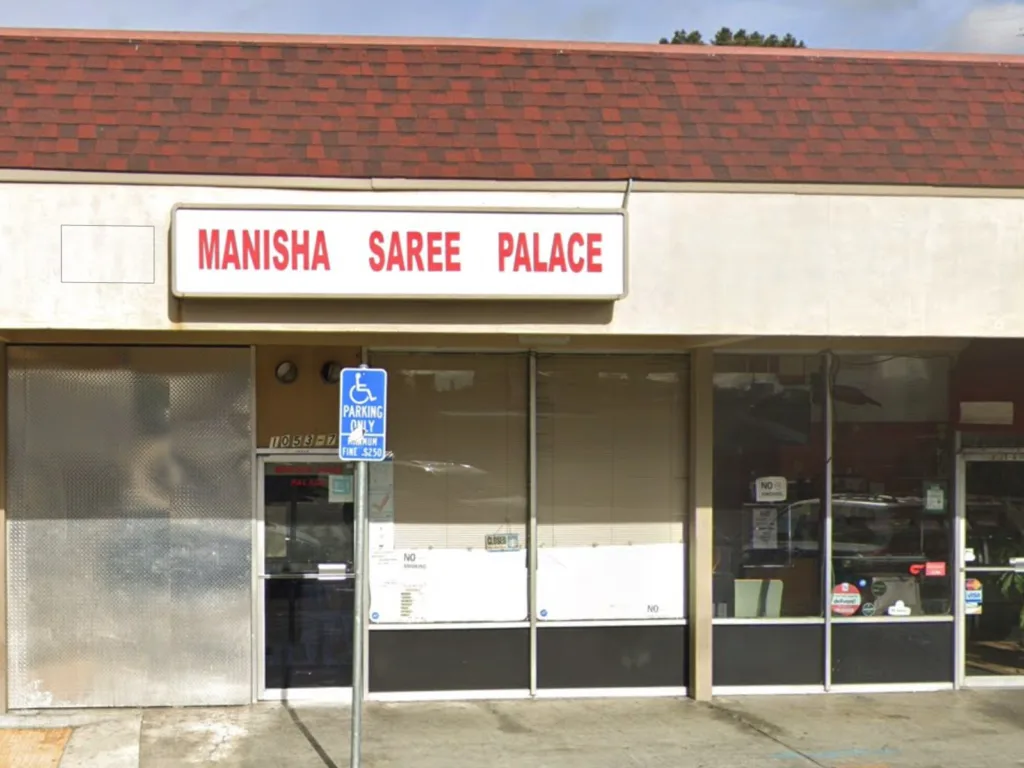 Manisha Saree Palace storefront with its red and white sign at 1053 E El Camino Real, Sunnyvale, California